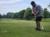 A golfer follows through on a strong drive under hot, humid skies during Stride’s fundraising tournament at Portage Golf Club. PortageOnline/ Tristen Sokolosky