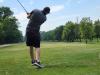 A golfer follows through on a strong drive under hot, humid skies during Stride’s fundraising tournament at Portage Golf Club. PortageOnline/ Tristen Sokolosky