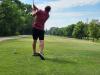 A golfer follows through on a strong drive under hot, humid skies during Stride’s fundraising tournament at Portage Golf Club. PortageOnline/ Tristen Sokolosky