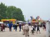 Crowds gather under cloudy skies for a fun-filled afternoon at the Morris Stampede Midway, where colourful rides, carnival games, and family memories take center stage. PortageOnline/ Tristen Sokolosky