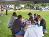 Judges taking their time, finding the best plate of food.