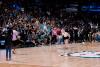Sydney Last taking the half-court shot challenge at a Winnipeg Sea Bears game. 