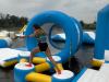 a person goes across an obstacle course