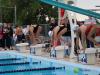 swimmers on a diving block