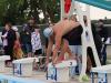 swimmers on a diving block
