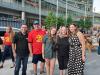 A MOTHER, FATHER, AND YOUNG ADULT DAUGHTER POSE FOR A PHOTO WITH MIKE THOM AND SYLVIA ST CYR